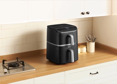 Аэрогриль Cosori Turbo Tower Pro на кухонной столешнице